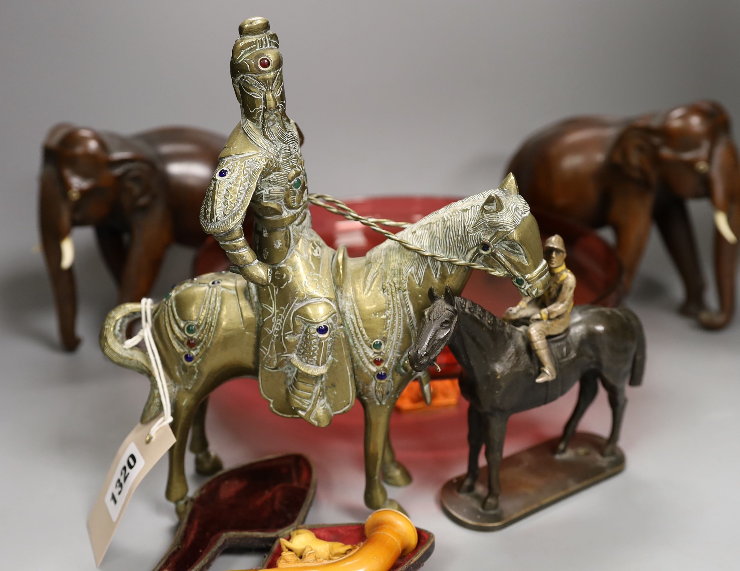 A cased Meerschaum pipe, a bronze group of a jockey on a horse, a ruby glass and gilt metal mounted dish, 26.5 cms diameter. etc
